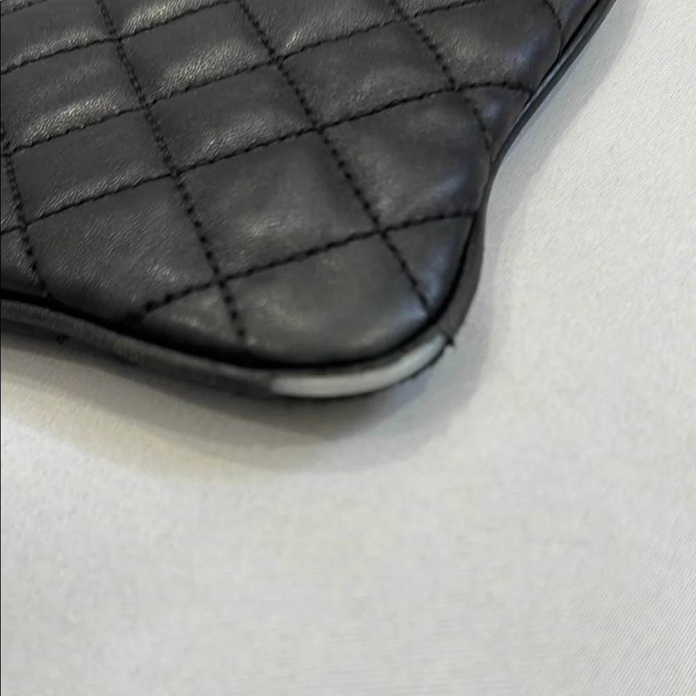 Michael Kors Black and Gold Quilted Leather Clutch